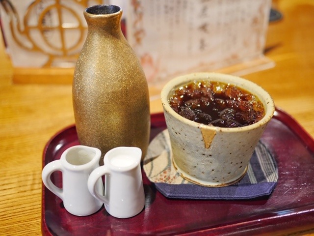 Shogun coffee in a gold carafe at Saza Coffee